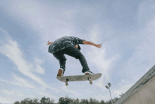 a man is doing a trick on a skateboard with the word vans on it