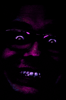 a close up of a person 's face with a purple background