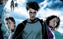 a harry potter movie poster shows a boy and two girls