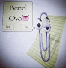 a paper clip with eyes and a tongue is talking to a speech bubble .