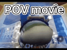 a video game character is riding a roller coaster in a room with the words pov movie written on it .