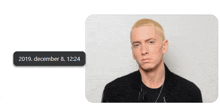 a picture of eminem with a date of december 8th 12:24