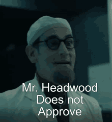 mr. headwood does not approve written on a dark background