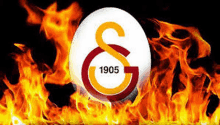 a logo for a soccer team is surrounded by fire .