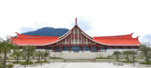 a large building with a red roof that says ' hong kong '