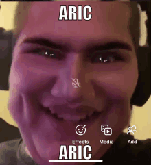 a close up of a man 's face with the name aric on the bottom