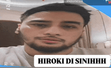 a picture of a man with a beard and the name hiroki di sinihhh on it