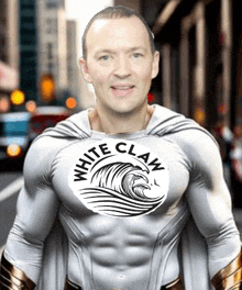 a man in a superhero costume with the word white claw on his chest .