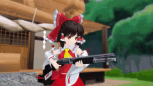 a girl in a red and white dress is holding a gun