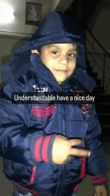 a young boy wearing a jacket with the words understandable have a nice day written on it