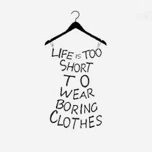 a hanger with the words " life is too short to wear boring clothes " on it