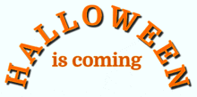 a sign that says halloween is coming in orange letters on a white background