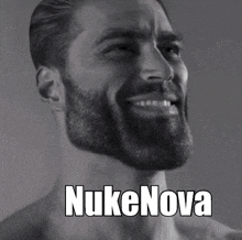 a man with a beard is smiling in a black and white photo with the words nukenova written on it .