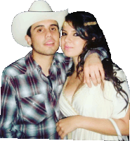 a man wearing a cowboy hat stands next to a woman wearing a white dress