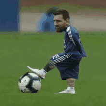 a soccer player with a very short leg is kicking a soccer ball .