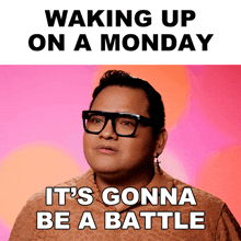 a man wearing glasses says waking up on a monday and it 's gonna be a battle