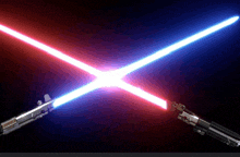 two lightsabers are crossed in the dark and one of them is red and the other is blue