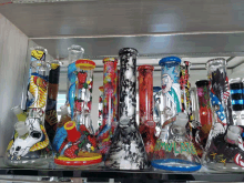 a row of colorful bongs with one that says ' jam class ' on it