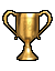 a pixel art of a gold trophy with two handles on a white background .