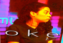 a woman stands in front of a neon sign that says " oke "