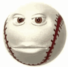 a baseball with a face on it .