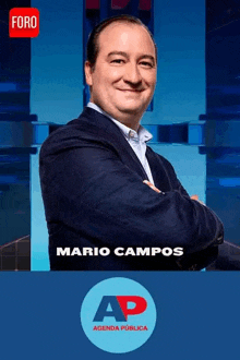 a man in a suit is standing with his arms crossed in front of a sign that says mario campos