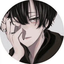 a black haired anime boy with red eyes and a ring on his finger is covering his face with his hand .