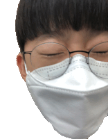 a person wearing glasses and a white face mask