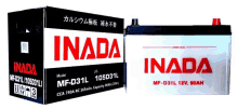 a inada battery sits next to a box