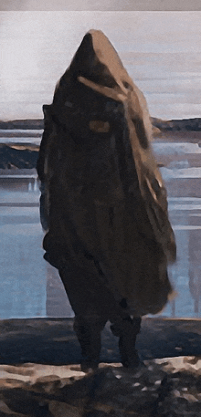 a painting of a person in a hooded cape