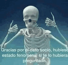 a skeleton is giving a thumbs up sign with a spanish caption .