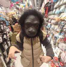 a person wearing a gorilla mask is pointing at something in a store