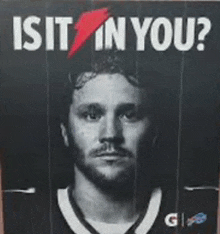 a black and white photo of a man with the words " is it in you " above him