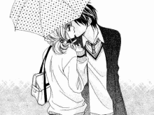 a boy and a girl kissing under an umbrella in the rain .