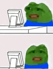 a green frog is sitting at a desk with a computer .