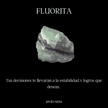 a piece of fluorita on a black background with a quote in spanish