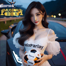 a woman holding a mixparlay soccer ball