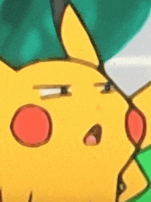 a close up of a pikachu with a surprised expression on its face