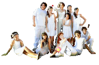 a group of people are posing for a picture in white dresses