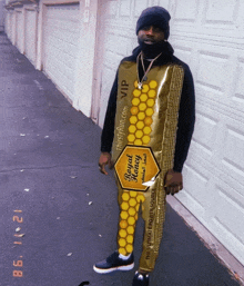 a man wears a package of royal honey