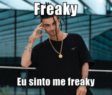 a man with dreadlocks is wearing a black shirt that says eu sinto me freaky on the bottom