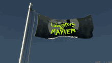 andy masterson 's laboratory of mayhem banner flying in the wind