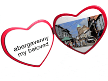 a pair of heart shaped glasses with abergavenny my beloved written on them