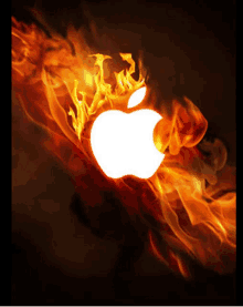 the apple logo is surrounded by flames and smoke