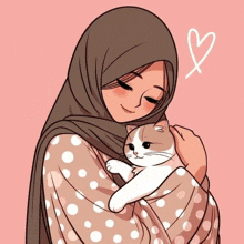 a woman in a hijab holds a cat in her arms