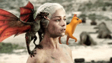 a woman with a dragon on her head and a cat on her back