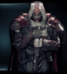 a blurred image of a man in armor with a cape