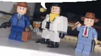 three lego figures are standing next to each other with one holding a briefcase