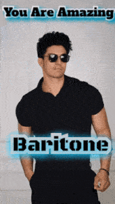 a man wearing sunglasses and a black shirt with the name baritone on it