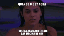 a woman with her eyes closed and a caption that says quando o boy acha